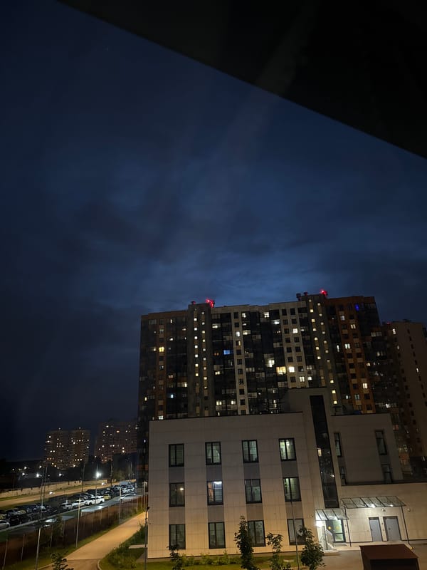 Quiet evening in Vatutinki: apartment towers and late-night TV