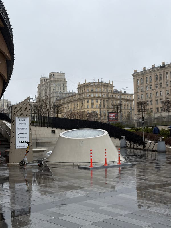Moscow scenes show wet streets, modern mall interior