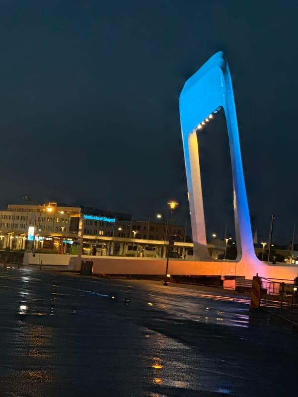Evening walk through Tallinn's illuminated port district captured