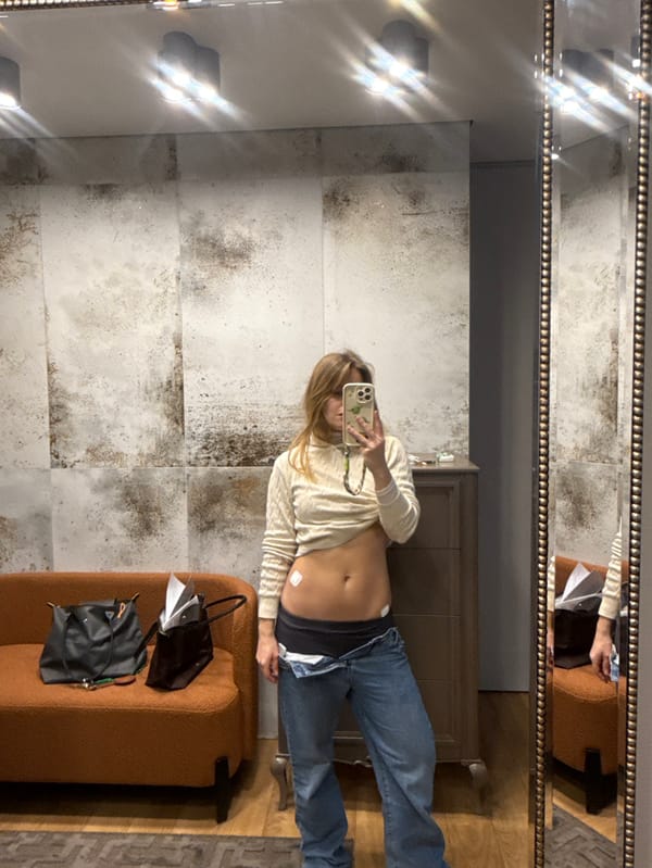 Young woman takes mirror selfie in Hrodna, Belarus