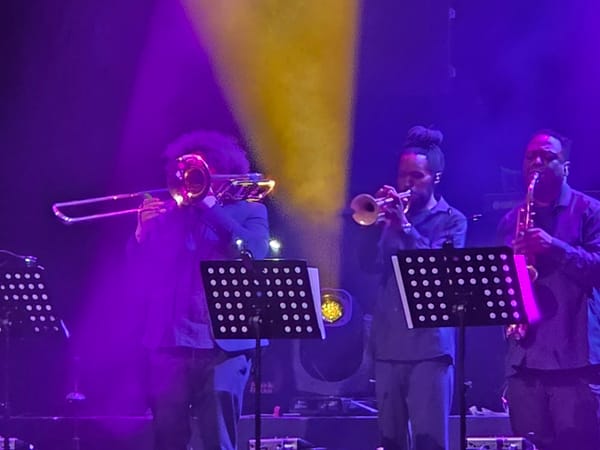 Live band performs in Johannesburg with colorful stage lighting