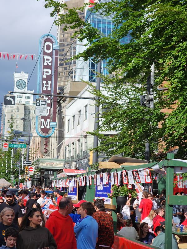 Street rap battle draws a crowd outside the Orpheum on Canada Day