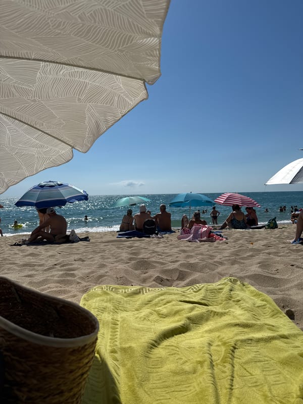 Sunny beach day in Varna — volleyball, sunbathers, and sand