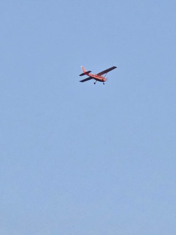 Red biplane and sunset captured in Yagodovo, Bulgaria