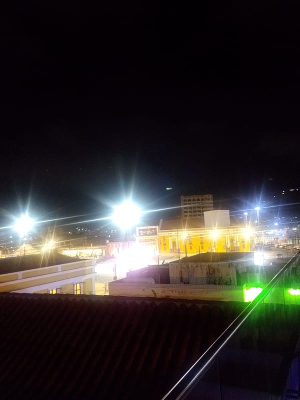 Nighttime view captured of illuminated buildings in Puerto Cabello