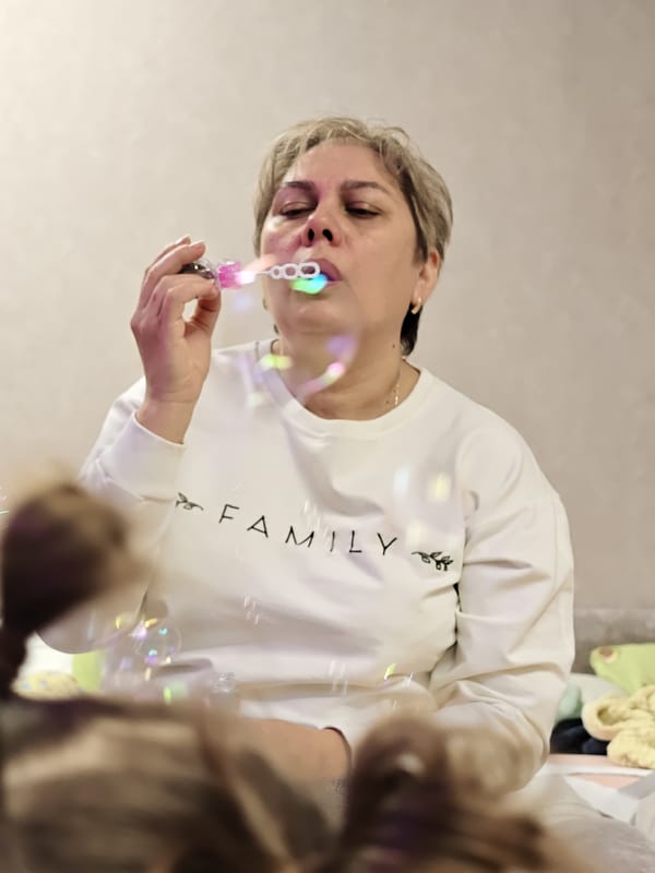 Children captured in quiet domestic moments in Chaikovsky, Russia