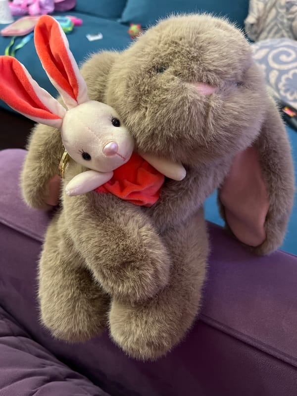 Plush toy collection photographed on purple furniture in Moscow