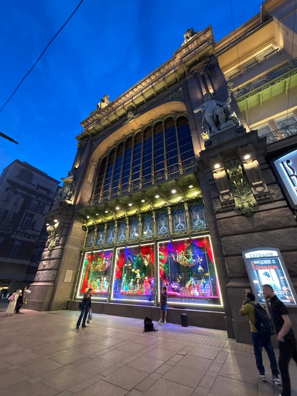 Evening stroll through illuminated Saint Petersburg landmarks captured