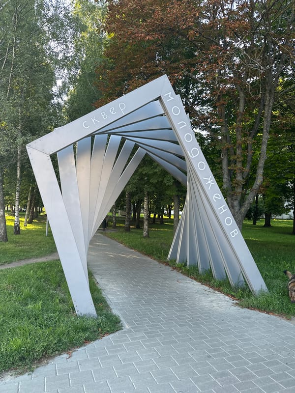 Afternoon in a Minsk park: sculptures, flowers, and everyday life