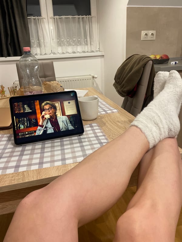 Person relaxes watching tablet content in Hévíz home