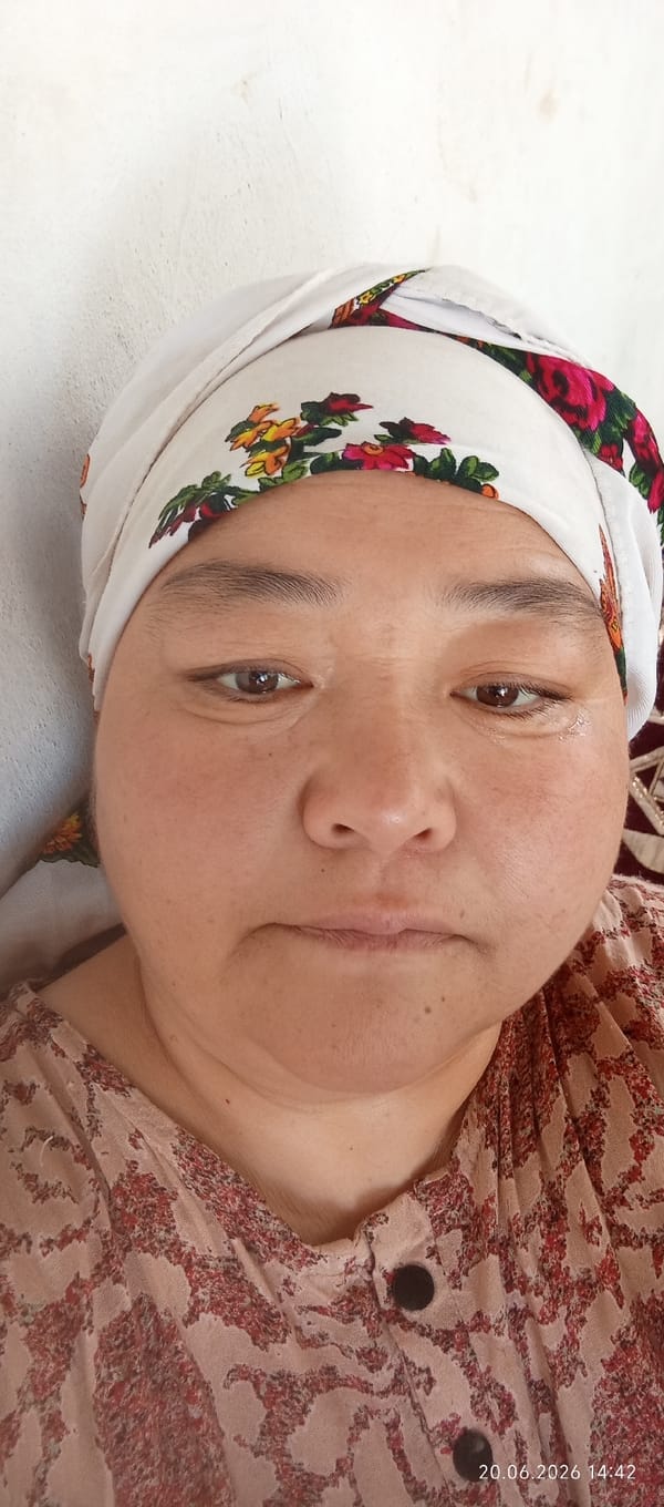 Portrait series in floral headscarf, Chon-Kara, Kyrgyzstan