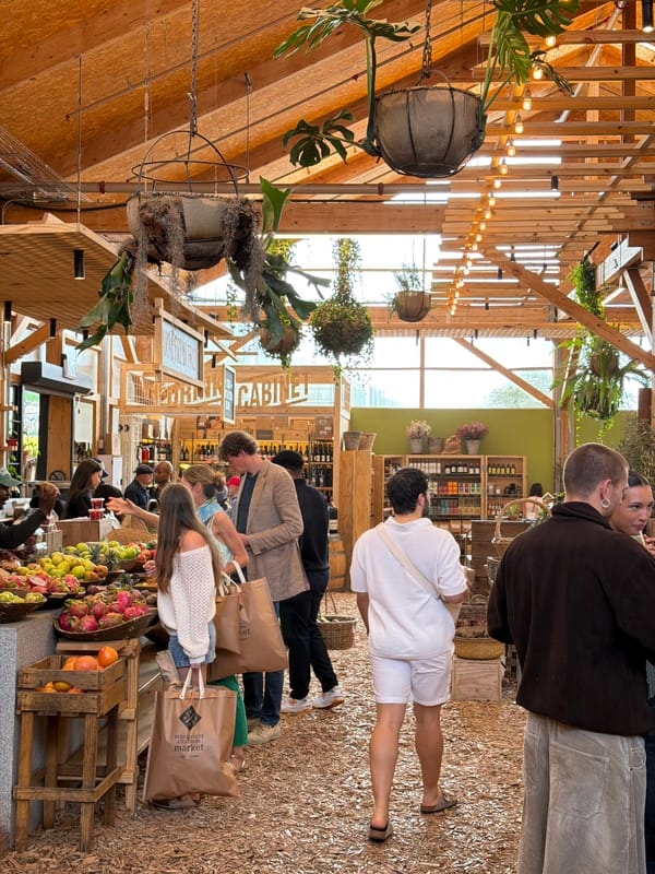 Shoppers browse Cape Town's Oranjezicht City Farm Market Saturday afternoon