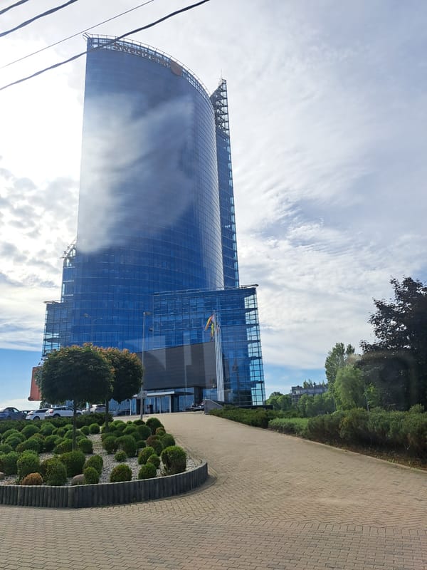 Bridge views and glass towers along the Daugava in Riga
