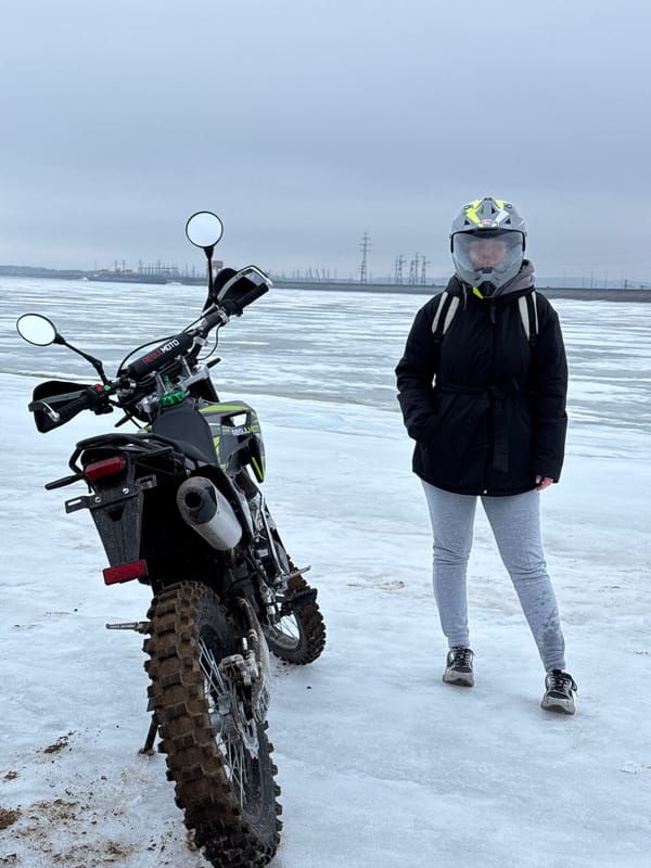 Dirt bike falls on snowy ground in Noviy, Russia