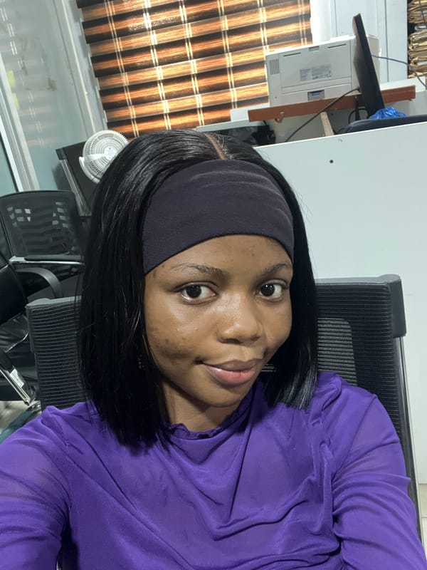 Woman photographed at office workspace in Ikeja, Nigeria