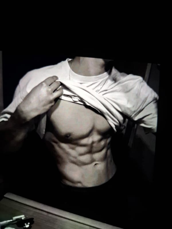 Person takes shirtless selfies in Burgas, Bulgaria