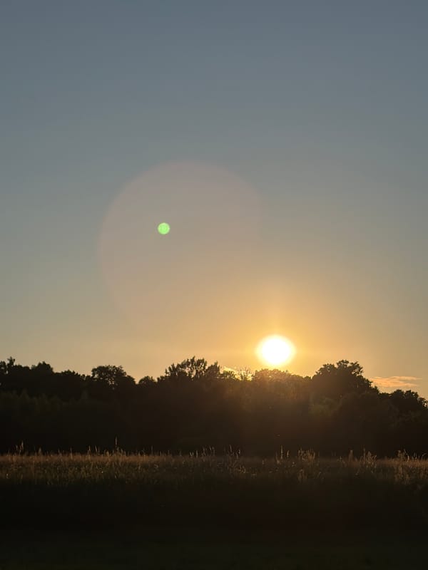 Sunset over Kraków's countryside and a clifftop historic complex