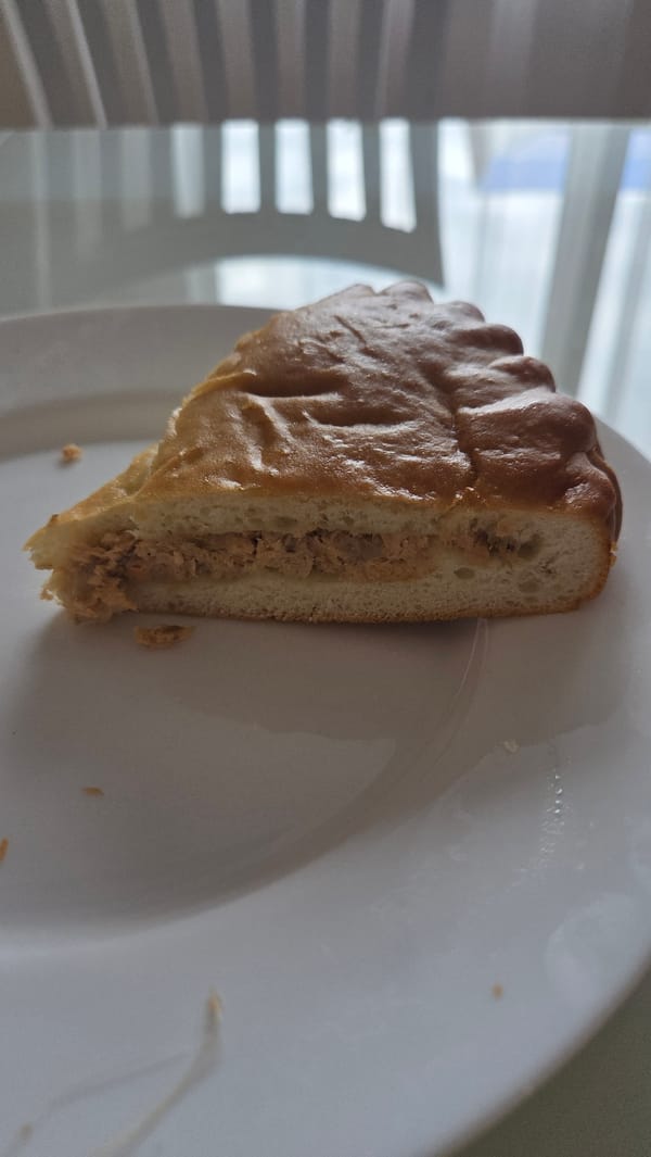 Food preparation captured in Chaikovsky: baked pastry and raw cutlets