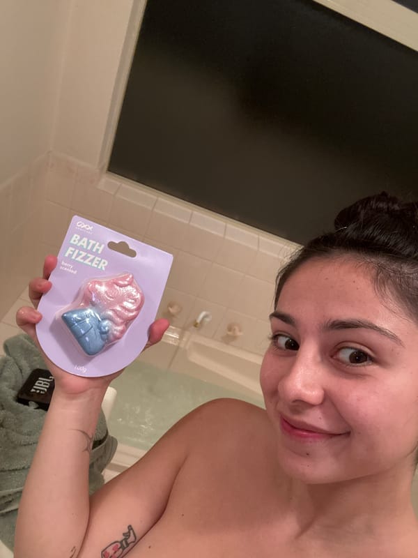 Woman takes bath selfie in Como, Australia