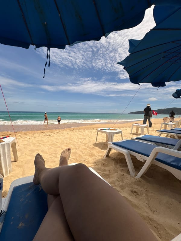 Lazy afternoon on Karon Beach, waves and sand