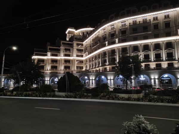 Evening urban lighting displays captured across commercial district