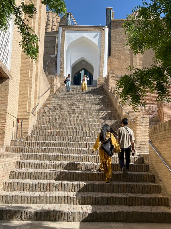 Exploring Shah-i-Zinda's tiled mausoleums and staircases in Samarkand
