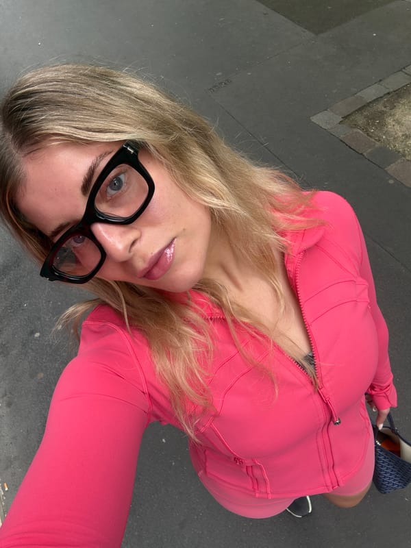 Woman in Pink Athletic Wear Photographed in Paris