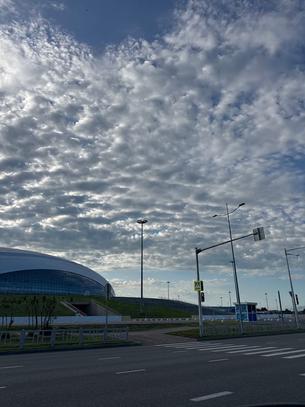Modern architecture observed under striking clouds in Sirius, Russia