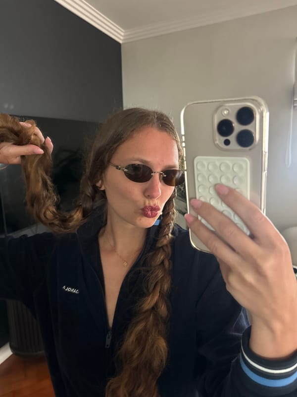 Woman takes selfies indoors in Cape Town