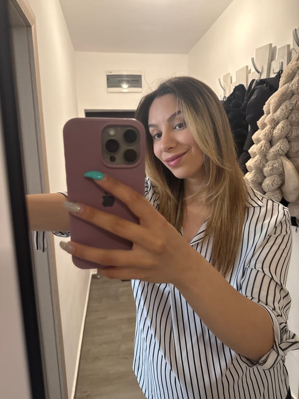 Woman takes mirror selfie at home in Stara Zagora