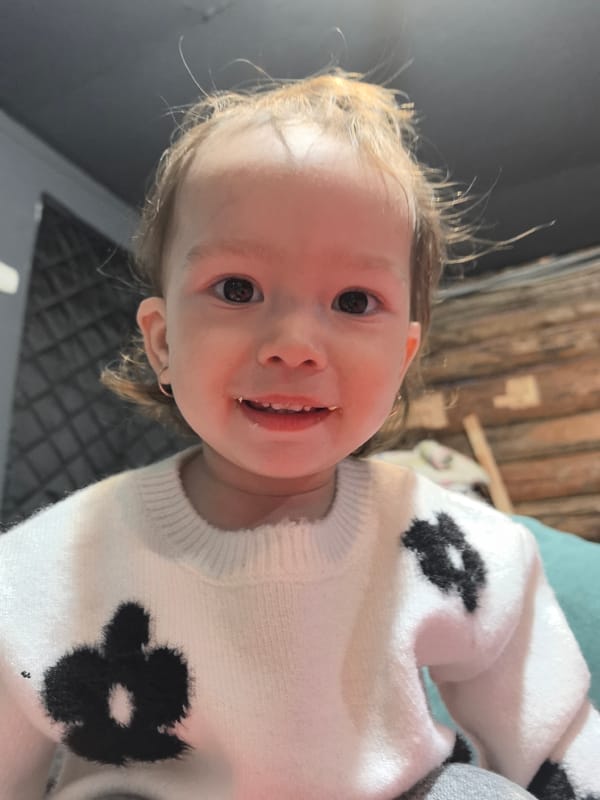 Toddler plays with toys at home in Noviy, Russia