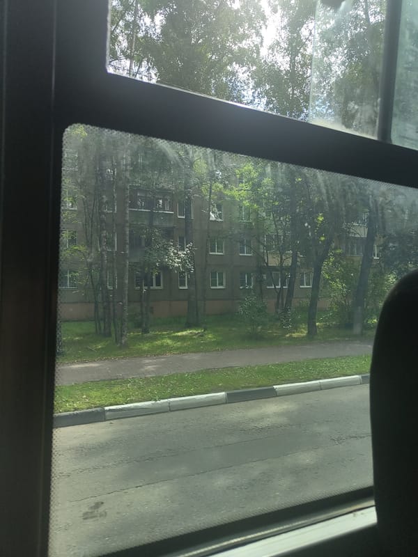 Street-level scenes from Ramenskoye: trucks, apartments, and public art