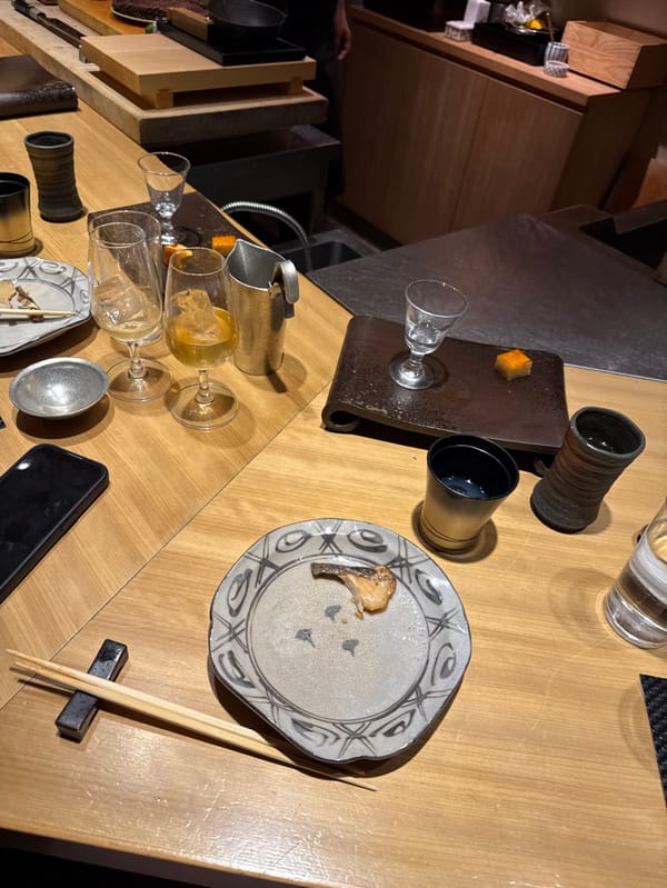 Diner captures table view at Japanese restaurant in Minato