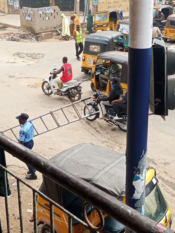 Daily street commerce bustles through Maiburiji Nigeria morning hours