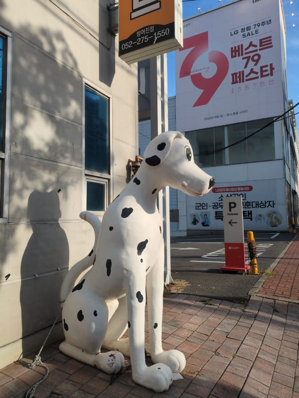 Urban scenes documented in Ulsan including Dalmatian statue, waterfront