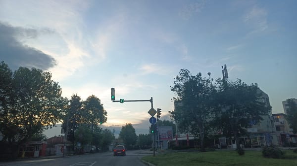 Evening street scenes documented during drive through Aytos, Bulgaria