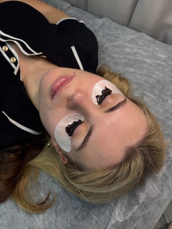 Beauty salon eyelash treatment session documented in Perm