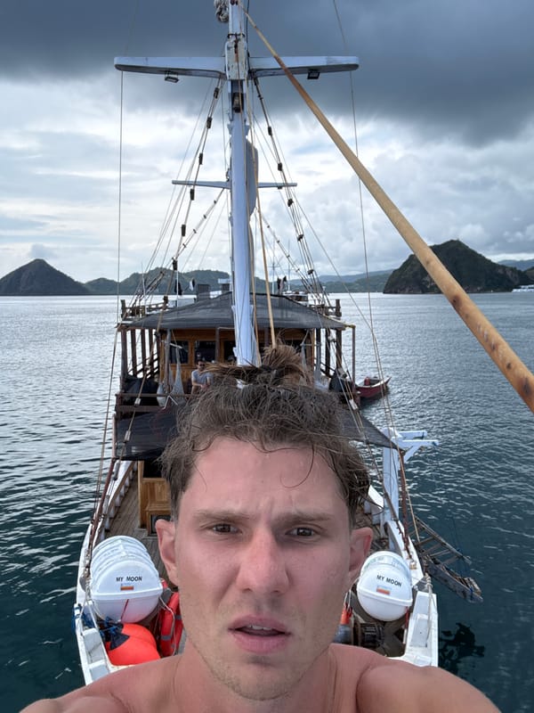 Man photographed on boat bow near Indonesian coast