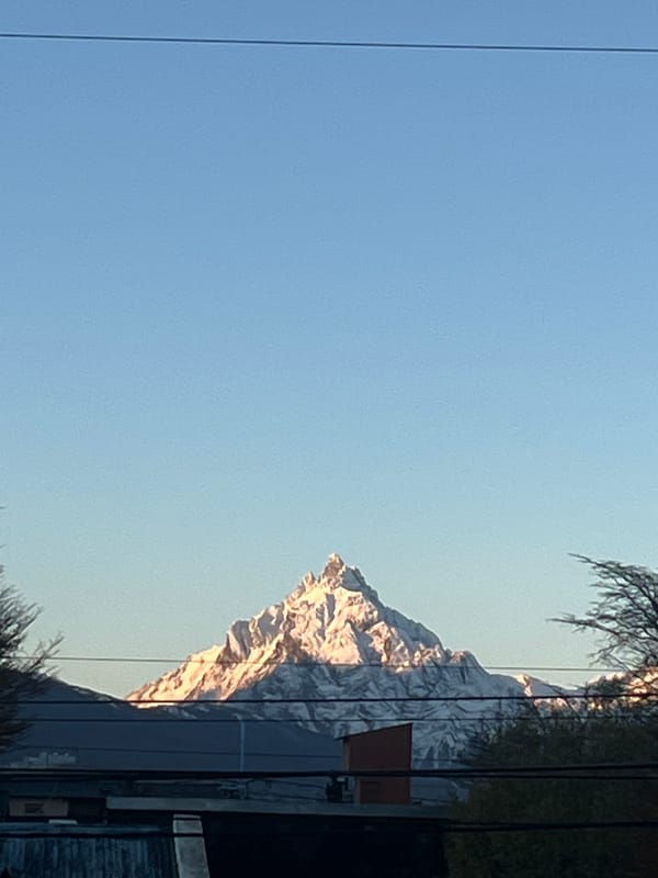 Mountain reflection captured in Ushuaia building windows