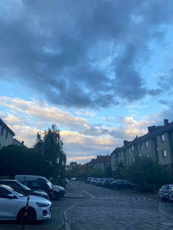 Storm clouds gathering over Wrocław residential streets