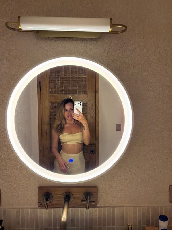 Woman takes selfies in various outfits in Mengwi