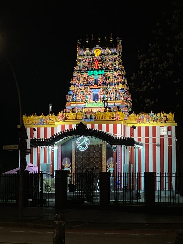 Hindu temple illuminated at night in Berlin