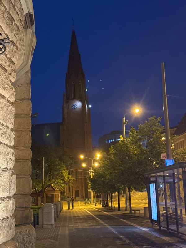 Night street scene captured from elevated view in Poznan