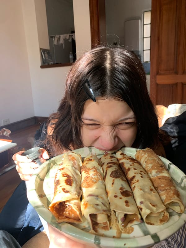 Young person enjoys crepes in Buenos Aires