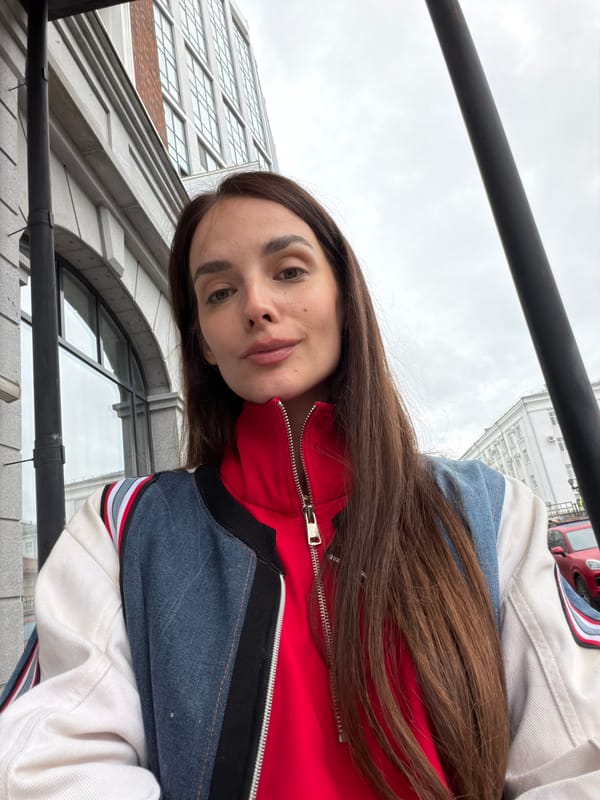 Rainy afternoon in Ufa: city streets, selfies, and a toddler in yellow