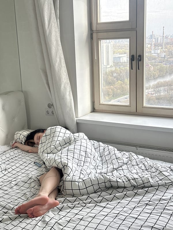 Person resting in bed captured in Khimki residence