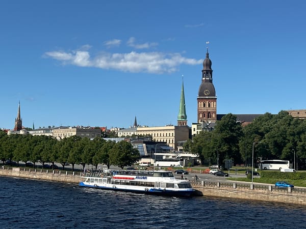 Riga waterfront and city landmarks on a sunny July afternoon