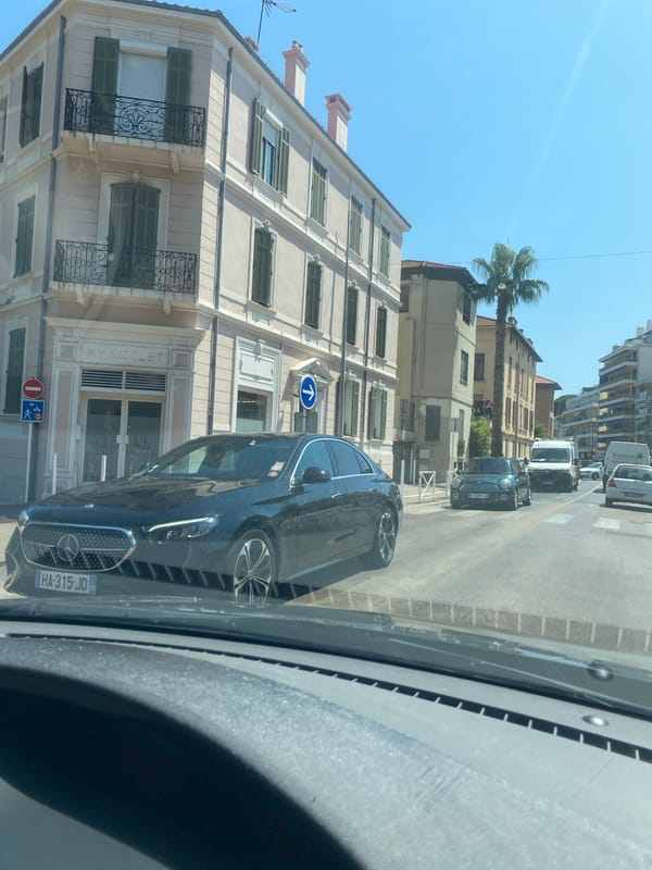 Cruising palm-lined streets through sunny Antibes