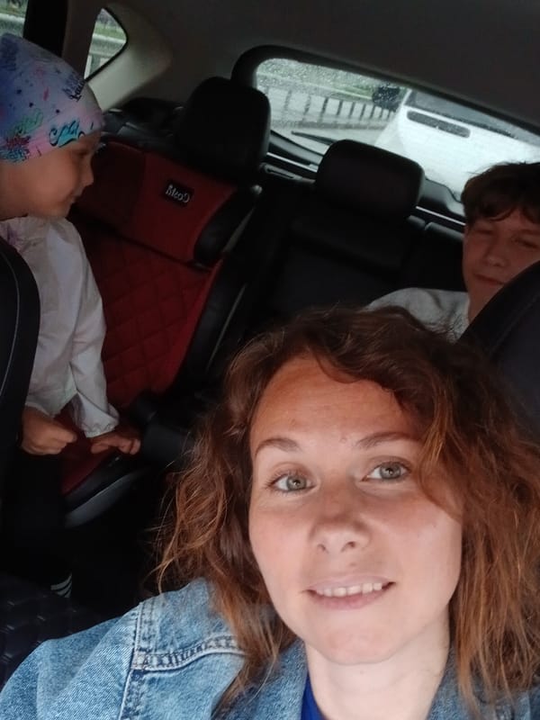 Rainy day selfie inside a car in Yekaterinburg