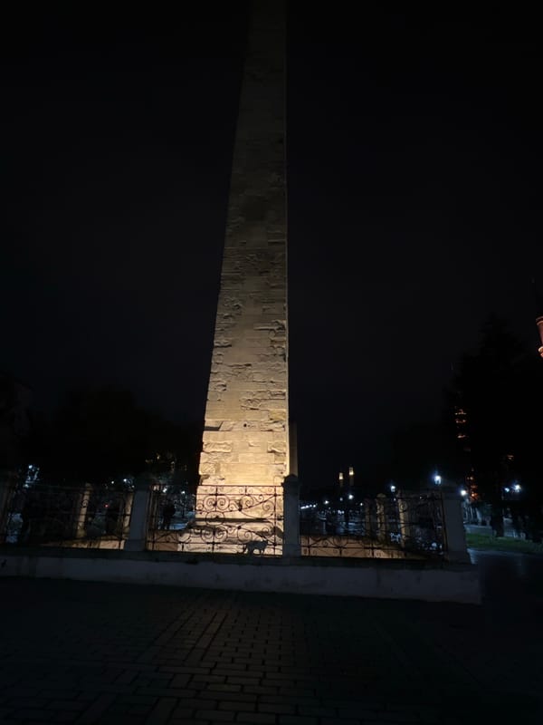 Obelisk of Theodosius illuminated at night in Istanbul